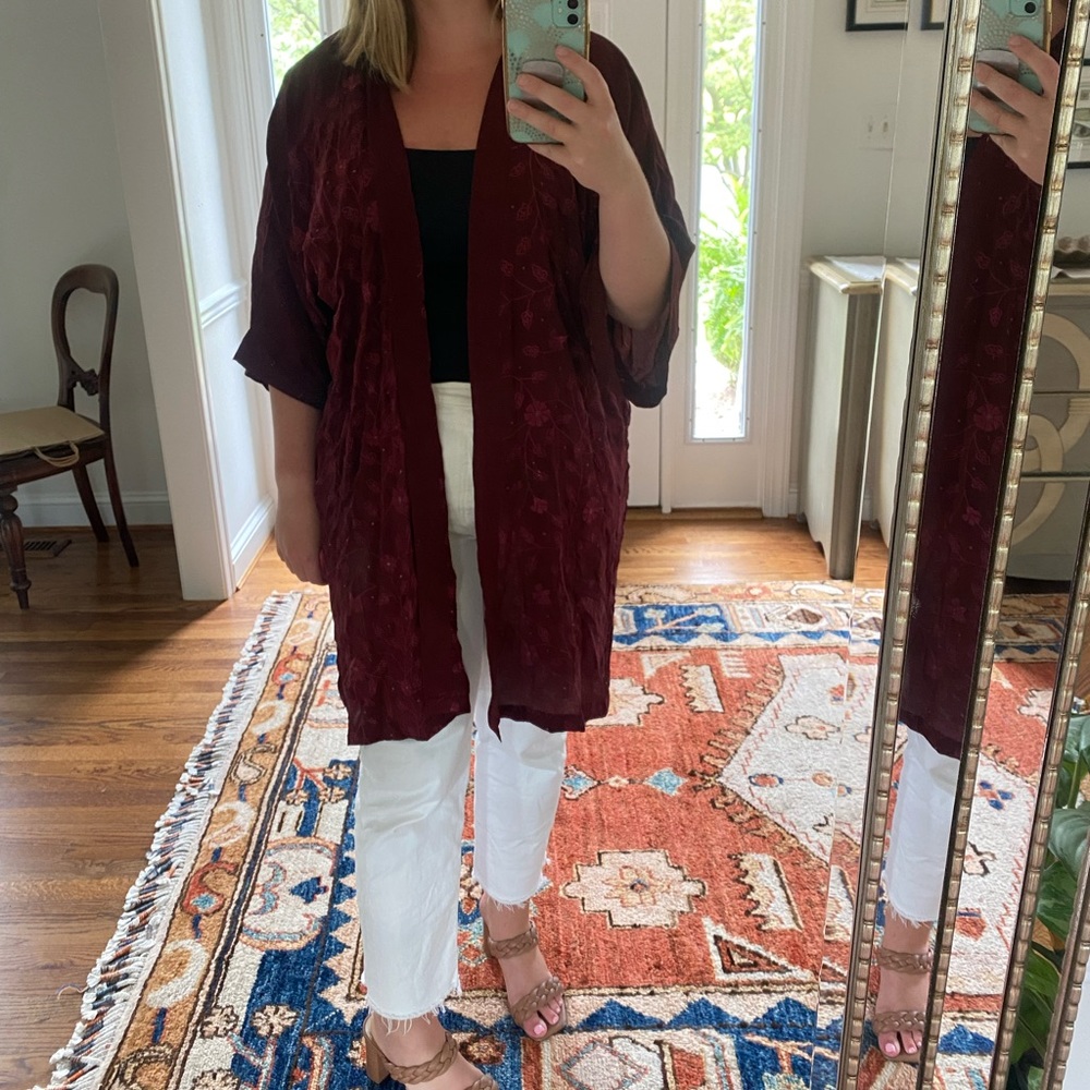 Raspberry Shrug with floral detailing